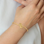 Загрузить изображение в средство просмотра галереи, 14k Yellow Gold Love Knot Flexible Slip On Cuff Bangle Bracelet