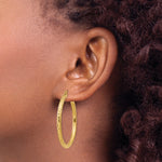 Load image into Gallery viewer, 10K Yellow Gold 40mm x 3mm Diamond Cut Sparkling Click Top Round Hoop Earrings
