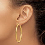Załaduj obraz do przeglądarki galerii, 10K Yellow Gold 50mm x 3mm Satin Diamond Cut Round Hoop Earrings
