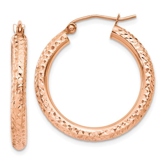 14k Rose gold hoop earrings on a white background