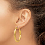 Load image into Gallery viewer, 14K Yellow Gold 40mm x 4mm Diamond Cut Classic Round Hoop Earrings

