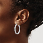 Lataa kuva Galleria-katseluun, 14K white gold square tube hoop earrings 30mm x 3mm, angled view showing polished finish

