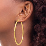 Φόρτωση εικόνας στο εργαλείο προβολής Συλλογής, 14K Yellow Gold 65mm x 3mm Lightweight Round Hoop Earrings

