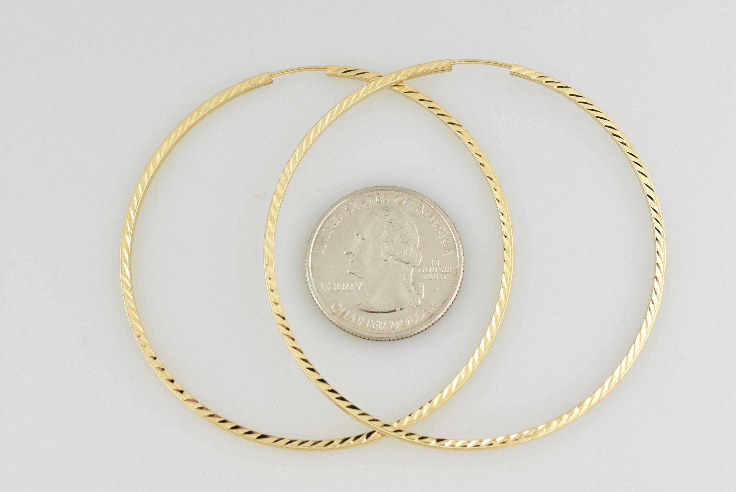 14k Yellow Gold 60mm x 1.35mm Diamond Cut Round Endless Hoop Earrings