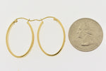 Indlæs billede til gallerivisning 14k Yellow Gold Classic Oval with Floral Design Hoop Earrings
