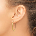 Afbeelding in Gallery-weergave laden, 14K Yellow Gold 30mm x 1.5mm Round Endless Hoop Earrings
