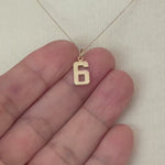 Load and play video in Gallery viewer, 14k Yellow Gold Number 6 Six Pendant Charm
