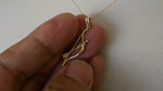 Load and play video in Gallery viewer, 14k Yellow Gold Bow and Arrow Open Back Pendant Charm
