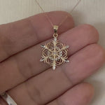 Load and play video in Gallery viewer, 14k Yellow Gold and Rhodium Snowflake Pendant Charm
