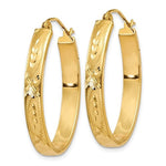 Lade das Bild in den Galerie-Viewer, 14k Yellow Gold Classic Oval with Floral Design Hoop Earrings
