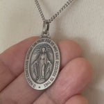 Load and play video in Gallery viewer, Sterling Silver Blessed Virgin Mary Miraculous Medal Pendant Charm
