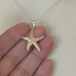 Load and play video in Gallery viewer, 14k Yellow Gold and Rhodium Starfish Pendant Charm
