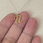 Load and play video in Gallery viewer, 14K Yellow Gold Initial Letter U Cursive Script Alphabet Pendant Charm
