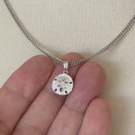 Load and play video in Gallery viewer, 14k White Gold Small Sand Dollar Pendant Charm
